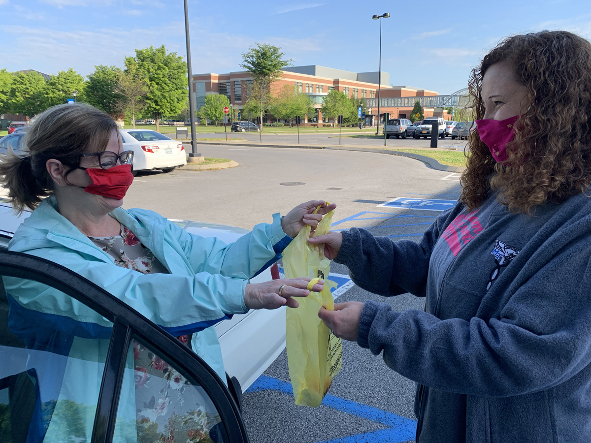 Jennifer Hyde, left, an executive aide in College of Education’s dean’s office, delivers old medications that her mother Joan Brown, no longer uses to the spring MTSU Drug Take-Back Day event Thursday, April 22, outside the Health, Wellness and Recreation Center on Blue Raider Drive. The 5½-hour collection time resulted in 71.7 pounds of medications that can be properly disposed of soon. (MTSU photo by Randy Weiler)