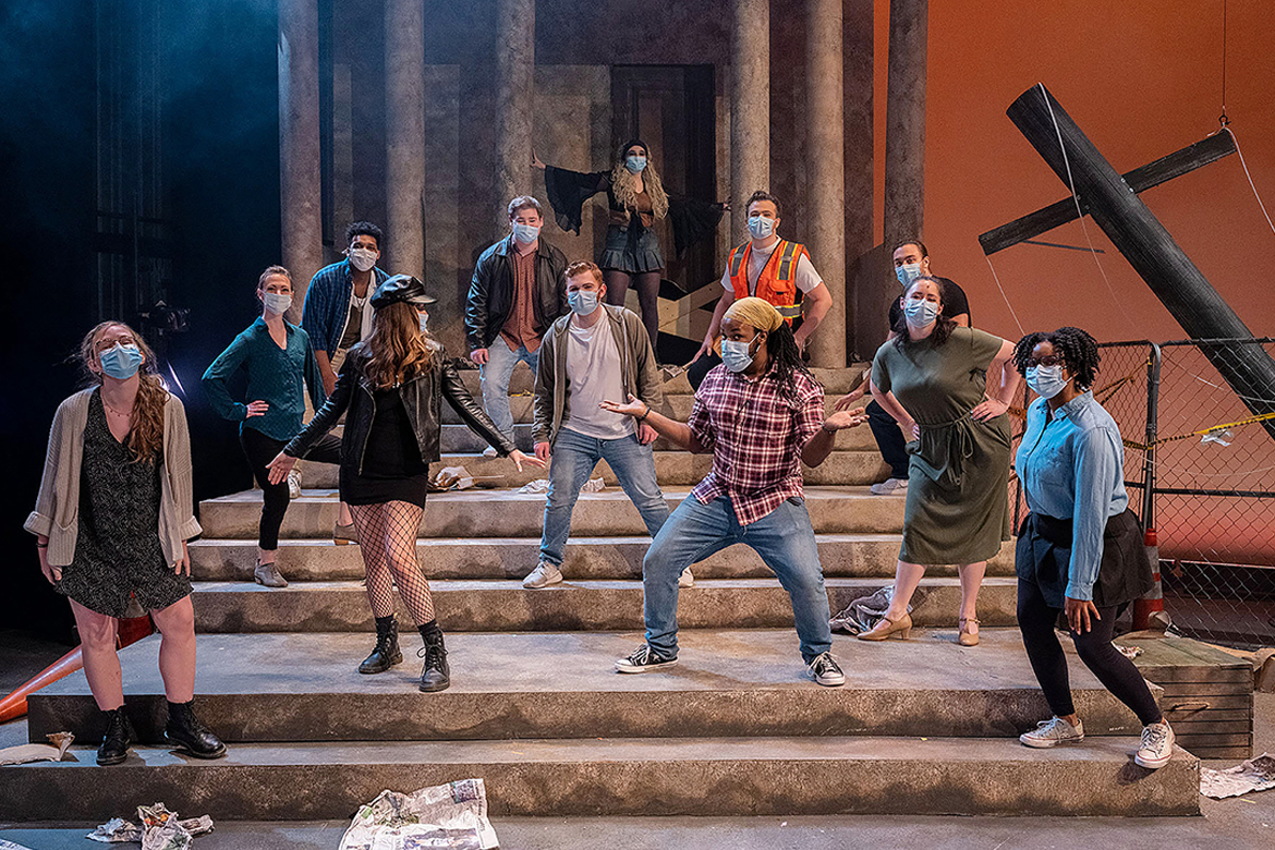 The cast of MTSU Theatre's spring production of "Godspell" assembles on their crumbling cityscape set, designed by senior Maggie Shivers of Kingston Springs, Tenn., during dress rehearsal Monday, April 5, in Tucker Theatre. Standing on the front two steps are, from left, senior Meredith Aydelott of Smyrna, Tenn.; junior Sarah Oppmann of Murfreesboro; senior Tajee Barnes of Decatur, Ga.; junior Aubrey Zurhellen of Covington, Tenn.; and junior Stokeley Ellison of Friendship, Tenn. On the remaining steps are, clockwise from left, junior Kassandra Hazard of Sevierville, Tenn.; senior Caleb Mitchell of Antioch, Tenn.; freshman Chris Cooper of Fairview, Tenn.; senior Amelia Clark of Murfreesboro; senior Kaleb Stone of Spring Hill, Tenn.; sophomore Garrett Holt of Clarksville, Tenn.; and junior Grant Malone of Knoxville, Tenn. (MTSU photo by Cat Curtis Murphy)