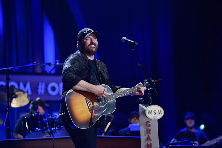 MTSU alumnus and country music artist Chris Young performs from the stage of the Grand Ole Opry during Saturday’s sold-out Opry Salute the Troops show in Nashville, Tenn. (MTSU photo by James Cessna)
