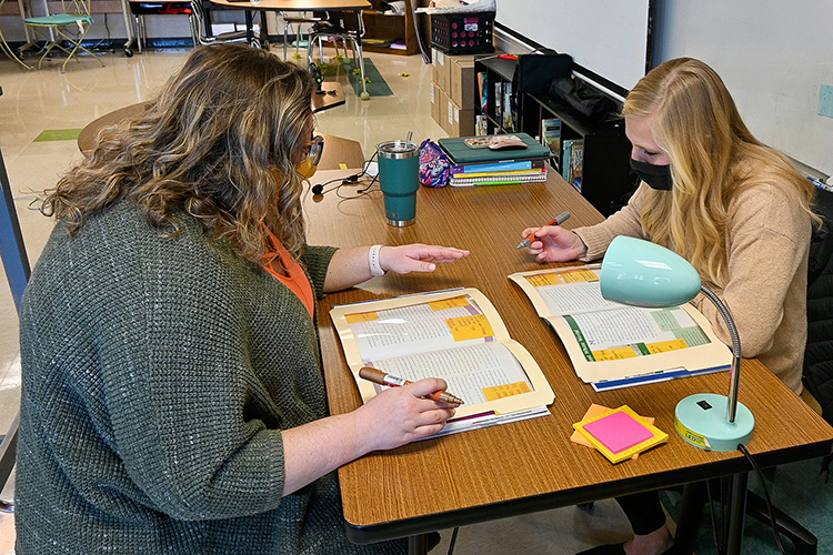 MTSU alumna Stefanie Edgell, left, fifth-grade teacher at Christiana Elementary School who recently won the Teacher of the Year Award, lesson plans with her student teacher, right, in her classroom on March 10, 2021. (MTSU photo by Stephanie Barrette)