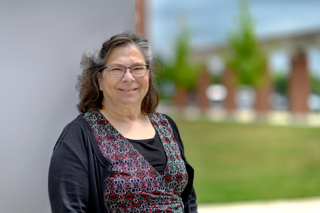 Service to students portrait of Trish Hayes, Social Work at the Academic Classroom Building.