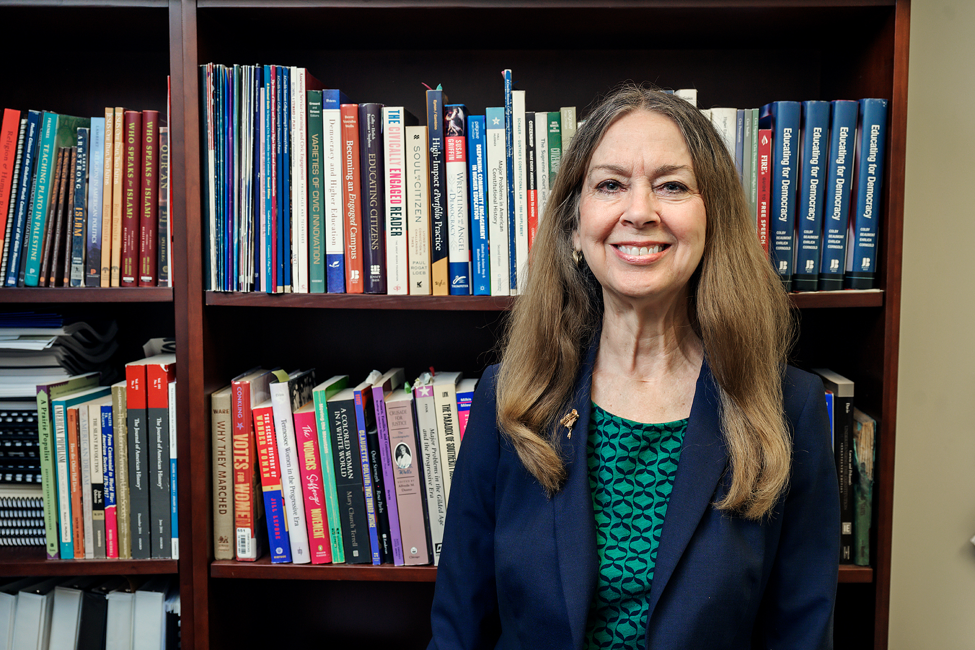 Mary Evins, History Faculty, in and around Paul W. Martin, Sr. Honors College Building. (Photo: Andy Heidt)