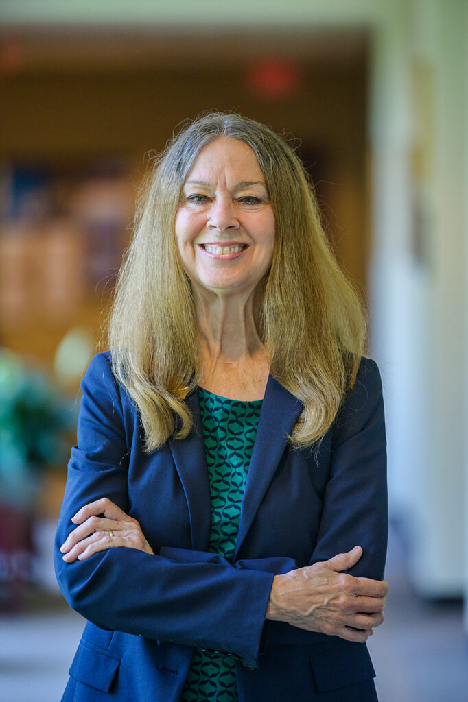 Mary Evins, History Faculty, in and around Paul W. Martin, Sr. Honors College Building. (Photo: Andy Heidt)