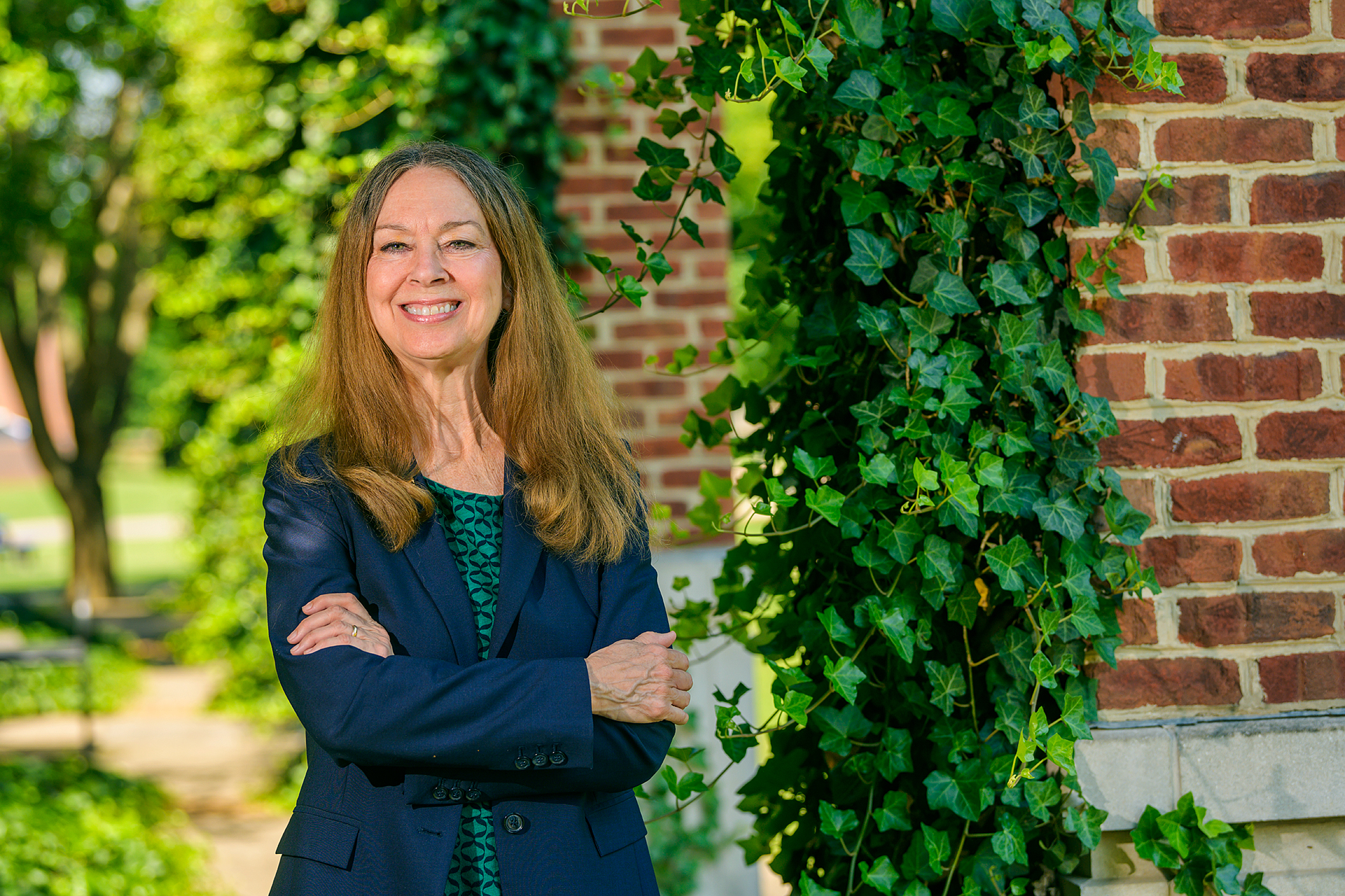 Mary Evins, History Faculty, in and around Paul W. Martin, Sr. Honors College Building. (Photo: Andy Heidt)