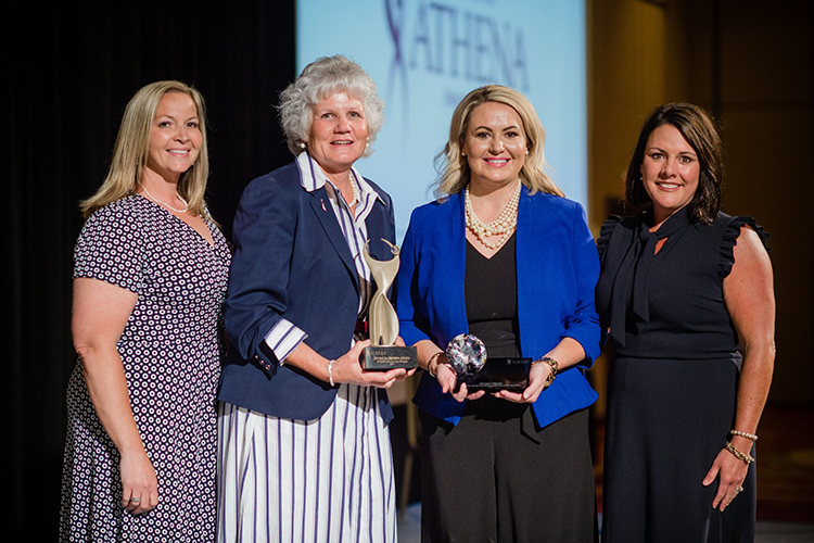 MTSU alumna Meagan Flippin, second from right, president and CEO of the United Way of Rutherford and Cannon Counties, holds her 2021 ATHENA Young Professional Leadership Award presented to her during a June 3 ceremony at Embassy Suites in Murfreesboro. Pictured, from left, are Lori Cutler, 2021 ATHENA co-chair; Patti James, 2021 Rutherford ATHENA Award recipient; Flippin; and Julie Lewis, 2021 ATHENA chair. (Photo courtesy of Rutherford CABLE)
