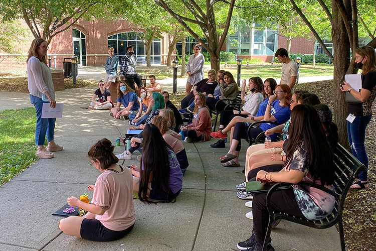 Deana Raffo, director of the MTSU Institute of Leadership Excellence and management professor, talks to 2021 ILE students in the courtyard of the Business and Aerospace Building. This year’s institute was held May 17-21. (Submitted photo)