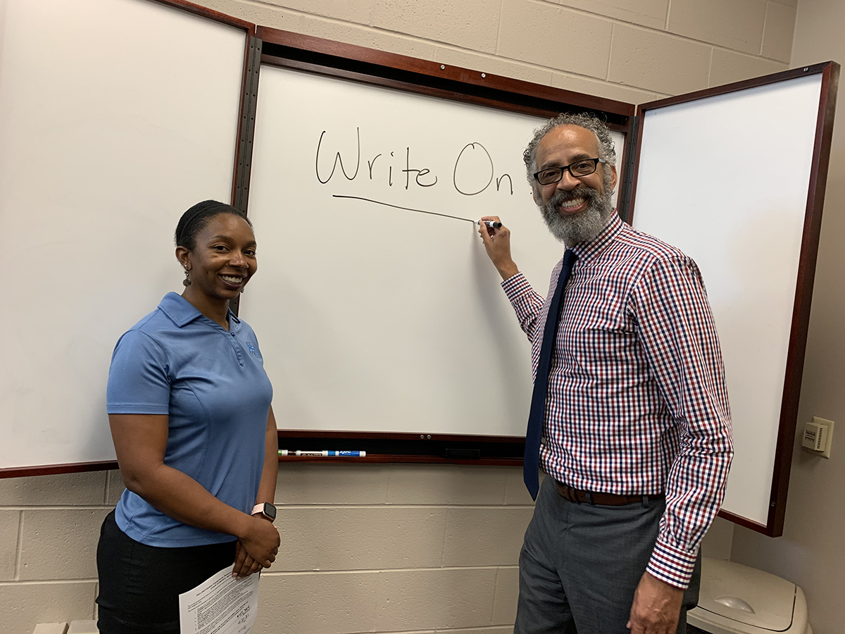 Brelinda Johnson, left, Scholars Academy manager in the MTSU Office of Student Success, and Vincent Windrow, associate vice provost, are excited to learn two TBR grants for TBR Student Engagement, Retention and Success Grant Awards for writing and peer mentoring are among six altogether received by MTSU faculty members across campus. Combined, they are worth more than $162,000 to help underserved students this coming fall and spring semesters. (MTSU photo by Randy Weiler)