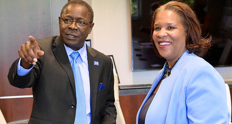 MTSU President Sidney A. McPhee shows Nashville State Community College President Shanna L. Jackson images of various campus buildings on display in a conference room in the Cope Administration Building on the Murfreesboro campus. (MTSU photo by Andrew Oppmann)