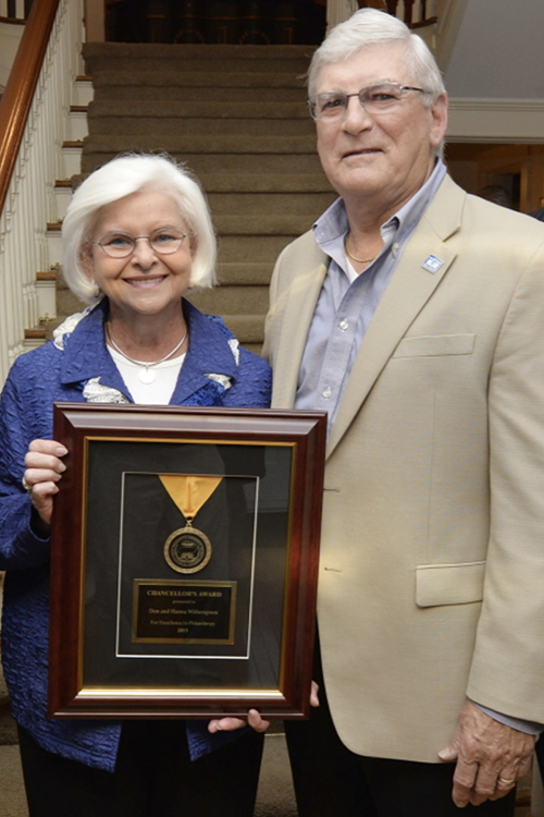 MTSU alumni Hanna, left, and Don Witherspoon accept an award for their assistance to the university at a reception for supporters of the MTSU Centennial Campaign at the President's House in this 2015 file photo. Don Witherspoon has established a new scholarship to pay tribute to his wife’s work in the MTSU library during their student days. (MTSU file photo by Andy Heidt)