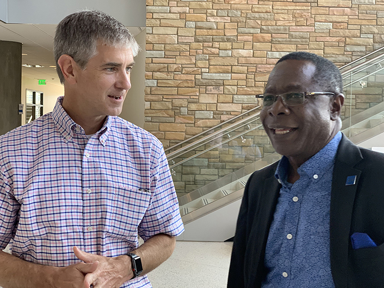 Interim MTSU College of Basic and Applied Sciences Dean Greg Van Patten, left, visits with university President Sidney A. McPhee in the Science Building recently. The college is home to 11 departments. (MTSU photo by Randy Weiler)