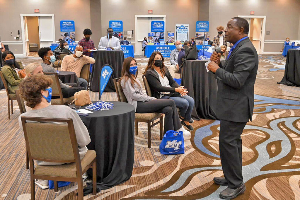 MTSU President Sidney A. McPhee talks to the Atlanta, Georgia, audience attending the True Blue Tour recruiting event held recently at The Westin Atlanta Perimeter North in Sandy Springs/Dunwoody. He shared about “quality academic programs, a safe, caring campus” and invited prospective students and their families to come and visit the university. (MTSU photo by Andrew Oppmann)
