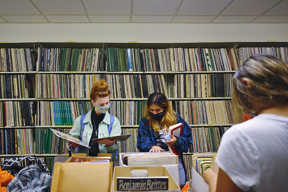 MTSU students looks through some of the resources inside the James E. Walker Library Wednesday, Oct. 21, during an open house and ribbon cutting celebrating the library’s switch from the Dewey Decimal System of classification to the Library of Congress system, a move library officials say will make finding library resources easier for them. (MTSU photo by Cat Curtis Murphy)
