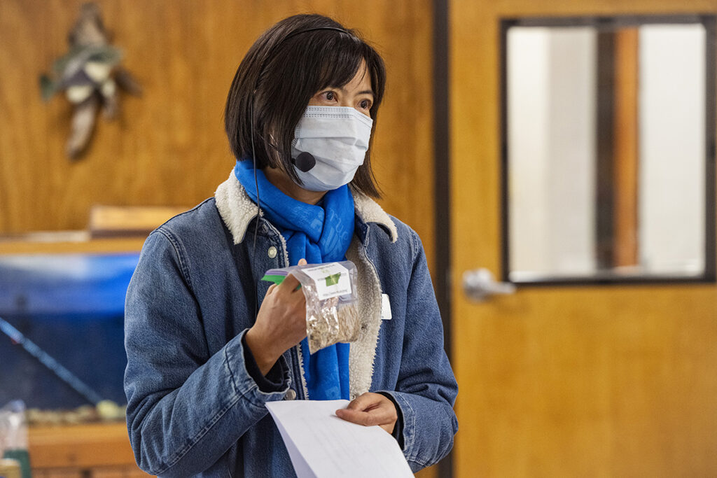 MTSU International Ginseng Institute Director Iris Gao talks about the two ounces of American ginseng seeds that each person attending the 2021 Tennessee Ginseng Growers Workshop received and urges them to plant the seeds this fall. (MTSU photo by Andy Heidt)