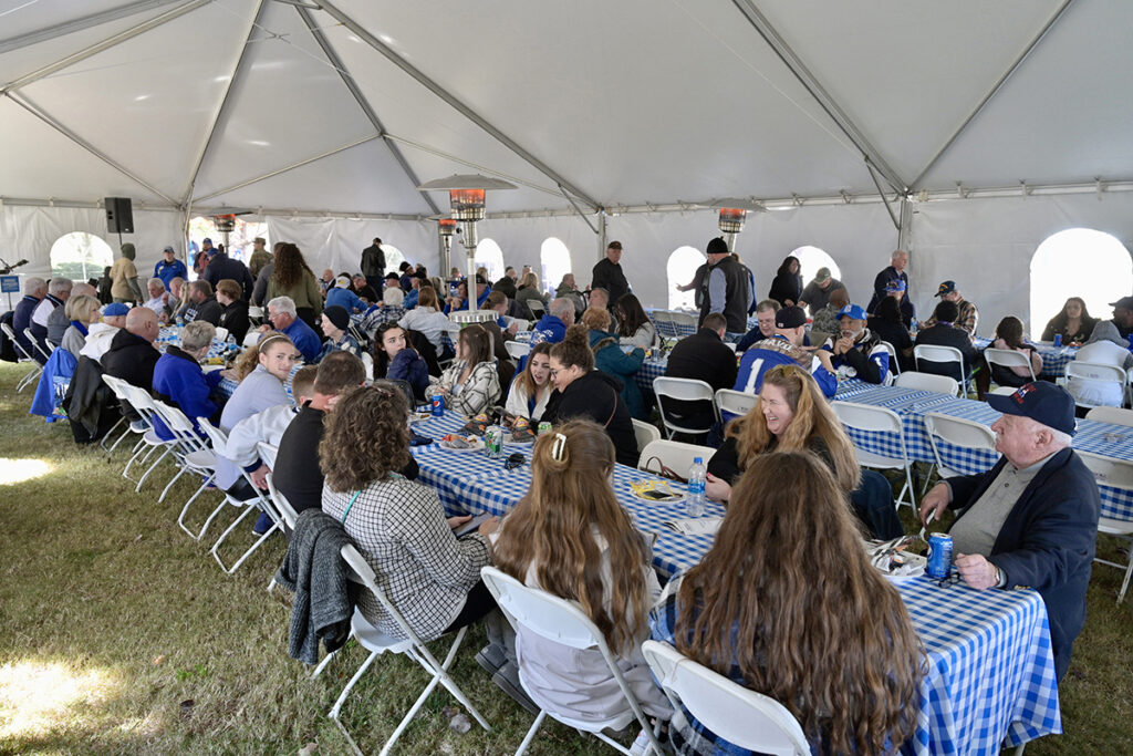 Veterans, current active duty personnel and their family members enjoy a complimentary barbecue meal provided by MT Athletics Saturday, Nov. 13, as part of 39th annual Salute to Veterans and Armed Forces game events tied into the Blue Raiders home game against FIU. (MTSU photo by Andy Heidt)