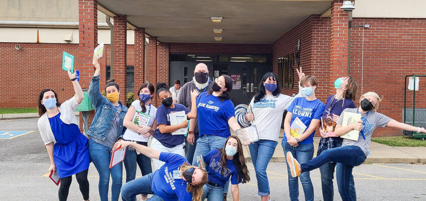 Several College of Education faculty are facilitating Literacy Night events that provide hands-on experience for students with local public-school children and the community. Pictured outside Walter Hill Elementary School at a recent event are, top row, from left, students Brooke Venkatraman, Ashley Purvis, Stacey Ells, Lauren Washington, Brian Myers, Tiffany Watt, Traci Hammiel, Sara Daily, Kristin Flowers, and Lauren Bracamontes. Bottom row, from left, are faculty member Bonnie Barksdale and student Emmy Lyles. (MTSU photo by Stephanie Barrette)