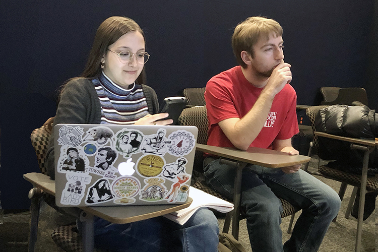 Maya Ronick, left, a freshman commercial songwriting major from Germantown, Md., sits with senior commercial songwriting major Michael Barber of Brentwood, Tenn., between recording sessions during one of this fall's “Studio Saturdays" for MTSU School of Music and Department of Recording Industry students in Studio D in the brand-new Main Street Studios facility. Ronick and Barber are members of the School of Music's Commercial Music Ensemble, which teamed up with Audio Production Program undergrads in an interdepartmental collaboration for professional experience. (MTSU photo by Gina E. Fann)
