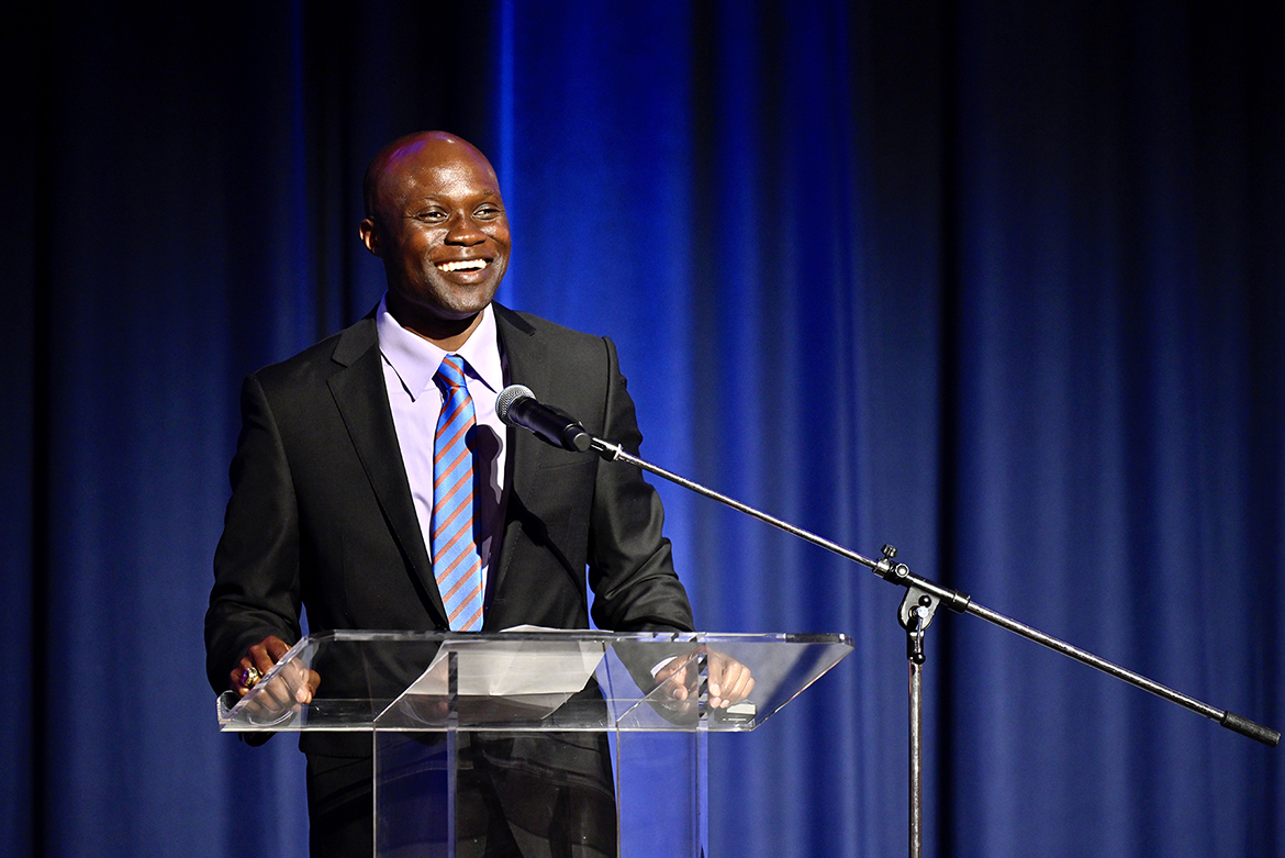 Dr. Andrew Owusu, a professor of health and human performance, addresses an audience after being formally announced as the 2022 recipient of the John Pleas Faculty Award in a Feb. 23 ceremony at the James Union Building at Middle Tennessee State University. (MTSU photo by Cat Curtis Murphy)