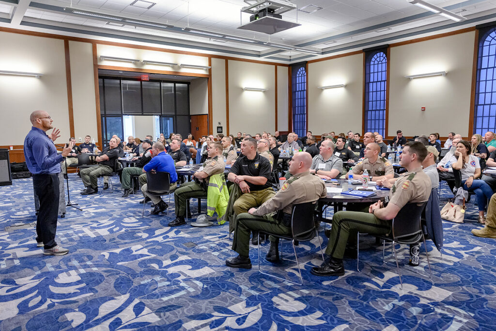 In a teaching moment, MTSU biology professor Kiel Ormerod provides history and years of forensic science research during his ADAPT lecture on the brain for an audience of law enforcement officers Monday, March 7, at the MT Center in the Ingram building. About 100 state, city and county officers attended the two-day workshop. (MTSU photo by J. Intintoli)