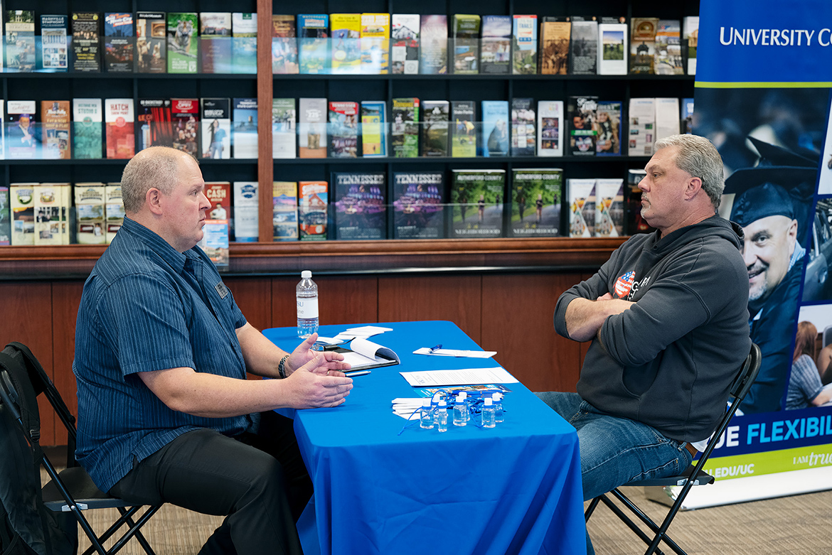 John Little, left, coordinator of the adult degree completion program through MTSU’s University College, speaks to a prospective student at a Finish Your Degree Q and A event held in March at the Rutherford County Chamber of Commerce. University College is hosting another drop-in Q and A event on May 17 at Williamson Inc. in Franklin, Tenn. (MTSU file photo by James Cessna)