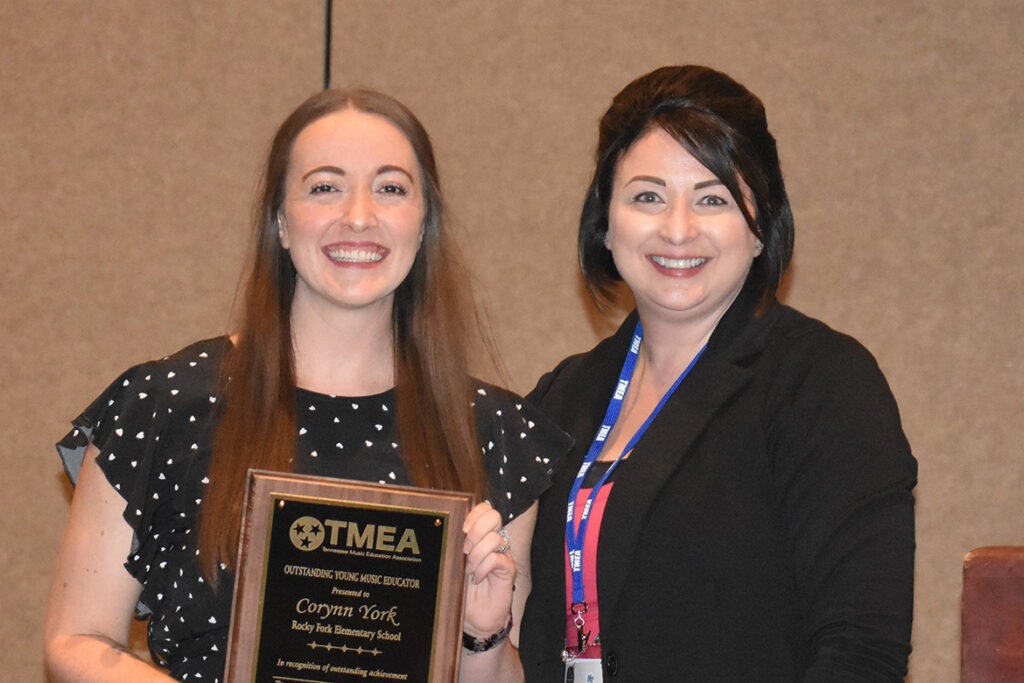 Corynn York, left, Middle Tennessee State University alumna and elementary music teacher at Rocky Fork Elementary School in Smyrna, Tenn., received the Outstanding Young Music Educator Award from the Tennessee Music Education Association, or TMEA, at the TMEA professional development conference awards banquet in Nashville on April 28, 2022. (Photo courtesy of the Tennessee Music Education Association)