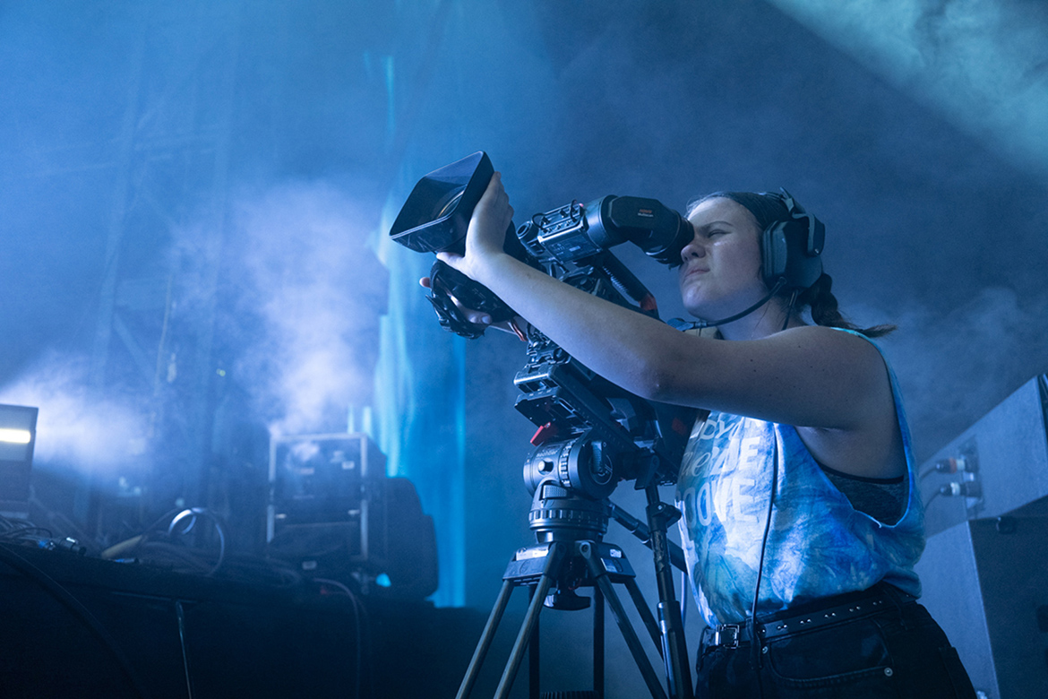 An MTSU College of Media and Entertainment student films a performance early Sunday, June 19, at the Bonnaroo Music and Arts Festival in Manchester, Tenn., one of 21 performances captured by students in the Media Arts and Recording Industry departments during the four-day festival. (MTSU photo by James Cessna) (MTSU photo by James Cessna)
