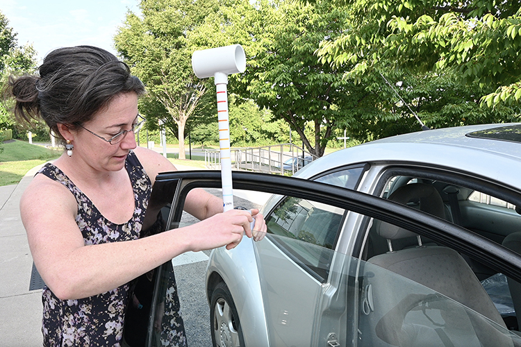 “Community scientist” volunteers in Nashville, Tenn., participated in Music City’s National Oceanic and Atmospheric Administration’s Heat Mapping Campaign and drove assigned routes in the city on Aug. 14, 2022, with heat sensors attached to their car windows, like pictured here, to record temperature, humidity, time and location data. Researchers, including Middle Tennessee State University professor Alisa Hass, will analyze the data to better understand which areas of Nashville are most exposed to heat and what mitigation methods will be needed in the future to reduce exposure to at-risk populations. (MTSU photo by Stephanie Barrette)