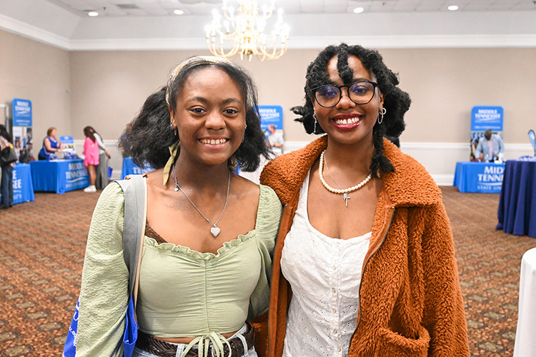Prospective Middle Tennessee State University student Kaitlin McKinney, right, attends the True Blue Tour event Wednesday, Oct. 5, 2022, at the Millennium Maxwell House in Nashville, Tenn., with her sister, Kaylee McKinney, to learn more about the university’s College of Liberal Arts programs. (MTSU photo by Stephanie Wagner)