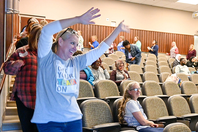 Attendees of the Play Symposium professional development event put on by Middle Tennessee State University’s College of Education dance along to a live performance by keynote speaker Coy Bowles, Zac Brown Band guitarist and early childhood education advocate, singing his children’s song “Coming Home” on campus on Oct. 1, 2022. (MTSU photo by Stephanie Wagner)