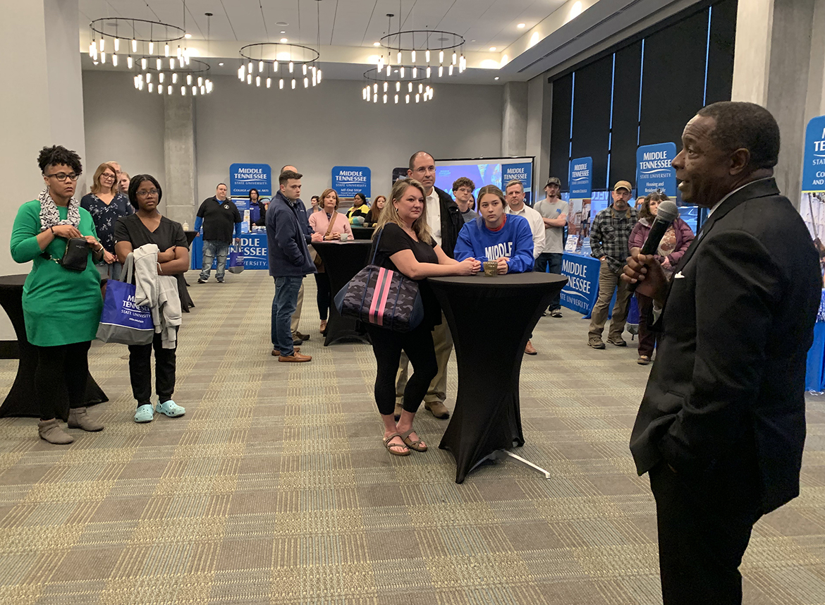 MTSU President Sidney A. McPhee, right, talks to prospective students in Lexington, Ky., on Tuesday, Nov. 1, about university programs, student success, caring faculty and more. The Murfreesboro, Tenn., university visited Lexington and Louisville as part of the 14-city True Blue Tour to recruit students this fall for 2023 and beyond. (MTSU photo by Randy Weiler)