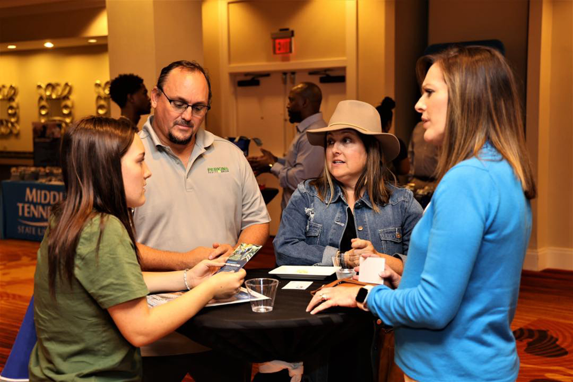 Prospective Middle Tennessee State University student Julia Watkins, left, an Eastern High School senior, and her parents, Mike and Laura Watkins, listen as Amy Medley, right, a Louisville high school counselor and also an MTSU parent, answers questions and advisers her on what to expect if she attends the Murfreesboro, Tenn., university. Julia Watkins, who plans to major in music business in the College of Media and Entertainment, has applied and been accepted to attend MTSU. (MTSU photo by David Foster)