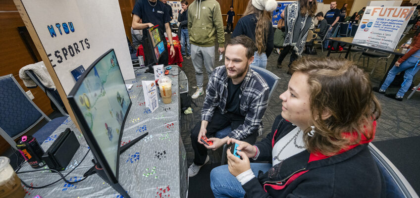 Middle Tennessee State University freshman Mars Alcantar, right, and junior Gatlin Murr, president of MTSU E-Sports, play Mario Kart on Nintendo Switch during the Spring Student Organization Fair in the Student Union Ballroom on Wednesday, Jan. 25. More than 200 students attended and met with nearly 100 student organizations. (MTSU photo by Andy Heidt)