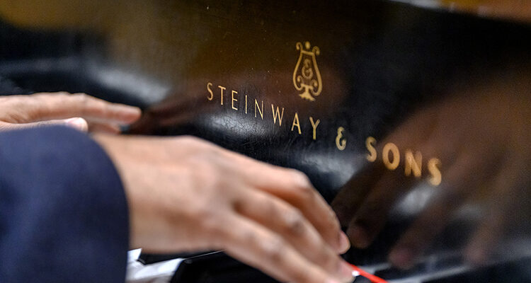MTSU piano professor Arunesh Nadgir rehearses Debussy's "Clair de Lune" on a Steinway concert grand piano in Hinton Hall on campus to prepare for the School of Music's "Steinway Anniversary Celebration Concert" on Tuesday, April 4. The free public concert, planned for 7:30 p.m., will feature a “piano extravaganza” of performances by MTSU students, faculty and alumni to showcase both their talent and the unmistakable tones of the Steinway. MTSU, which has 60 grand and upright Steinways, is marking its 20th anniversary as one of 200-plus "All-Steinway Schools" in the world and the first designated as such in Tennessee. (MTSU photo by J. Intintoli)