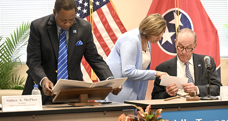 From left, MTSU President Sidney A. McPhee, Kimberly Edgar, his chief of staff and executive assistant, and Board of Trustees Chairman Stephen Smith prepare for the board’s quarterly meeting Tuesday, April 4, 2023, in the Miller Education Center on Bell Street in Murfreesboro, Tenn. (MTSU photo by J. Intintoli)