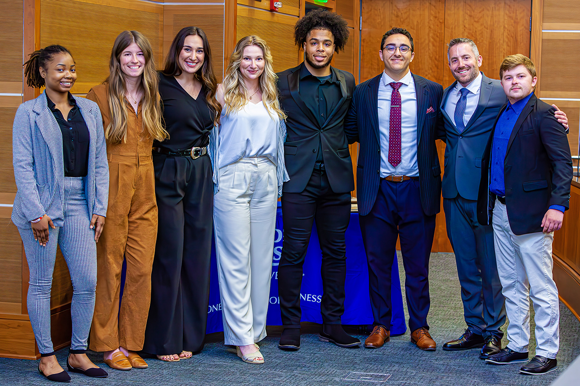 From left, 2023 MTSU Business Plan Competition finalists Alexis Mahon; Savannah Tucker; Jamie George and Haley Harris (third place); Mervyn Thomas-Crawford (first place); Samer Kattih; Cory Sherman (second place); and Britton Cherry pose for a group photo following the finals presentations April 26 in the Student Union Parliamentary Room at Middle Tennessee State University. All finalists were awarded at least $2,000 up to the top prize of $9,000 won by Thomas-Crawford. (MTSU photo by Tom Beckwith)