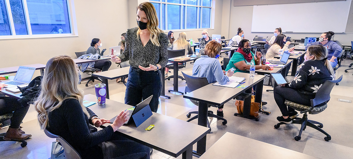 In this fall 2020 file photo, Katie Schrodt, Middle Tennessee State University associate literacy professor, works with students in her literacy course at the College of Education building on campus. MTSU’s Department of Elementary and Special Education recently earned an A+ distinction from the National Council on Teacher Quality for providing the most effective, research-based methods of reading instruction to MTSU-trained future teachers. (MTSU file photo by Andy Heidt)