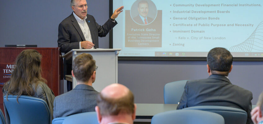 Patrick Geho, state executive director of the Tennessee Small Business Development Center at MTSU and management professor, discusses economic development loan programs Nov. 10, 2023, during a session of the Jennings and Rebecca Jones Chair of Excellence in Urban and Regional Planning Scholars Program in the Business and Aerospace Building at Middle Tennessee State University in Murfreesboro, Tenn. (MTSU photo by Andy Heidt)
