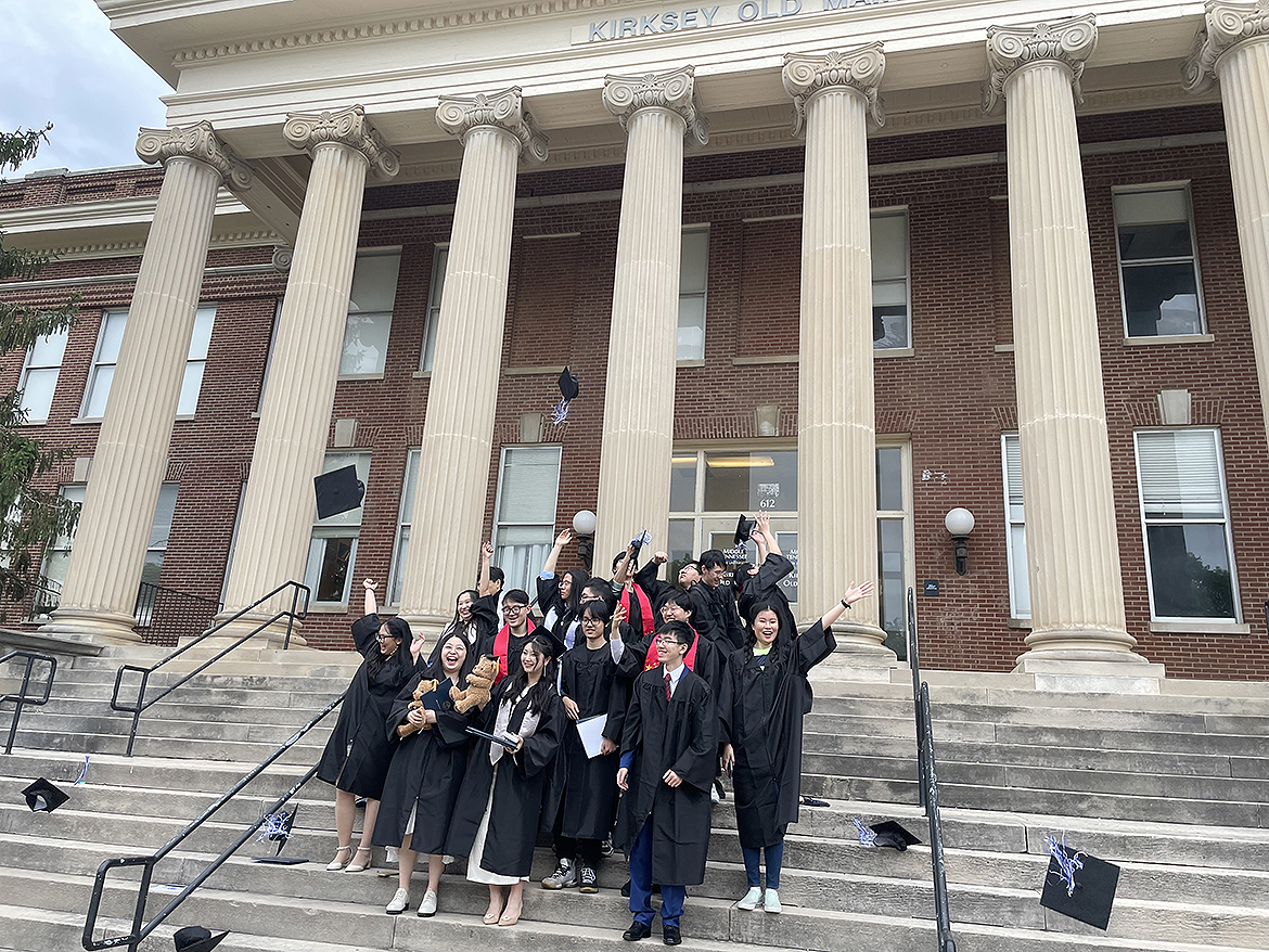 Shown in front of Kirksey Old Main, a group of Middle Tennessee State University Actuarial Science students toss their caps after graduating. For the second time in four years, the Casualty Actuarial Society has recognized MTSU's program with a prestigious honor — this time with the Gold Tier award. (Submitted photo)