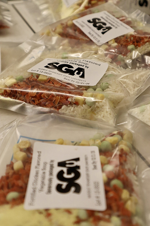 Pre-packed nonperishable food items such as these vegetable soup meals were part of the 15,000 meals that more than 80 student volunteers packed up as part of the university’s annual Big Event community service project held Wednesday, Feb. 21, in the Student Union Building. Organizers said most of the meals will be donated to the MTSU Food Pantry and the remainder will be donated to Nourish Food Bank. (MTSU photo courtesy of Jackie Victory)