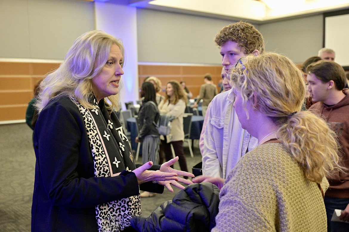 Middle Tennessee State University College of Media and Entertainment Dean Beverly Keel, left, answers questions from a future student who has been awarded a major scholarship from the university. The exchange occurred Monday, Feb. 19, at the conclusion of the President’s Celebration of Scholars, held in the Student Union Ballroom. (MTSU photo by Andy Heidt)