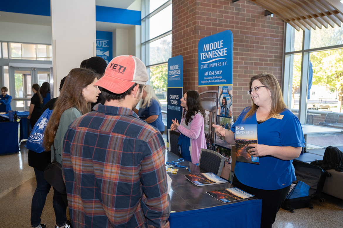 Meredith Wright, right, enrollment coordinator at Middle Tennessee State University One Stop, answers questions from prospective MTSU students during the November True Blue Preview event in the Student Union. MTSU staff and administrators are preparing for the True Blue Preview events on Saturday, Feb. 10, and Saturday, March 23. The events are free. Visit www.mtsu.edu/rsvp to register.