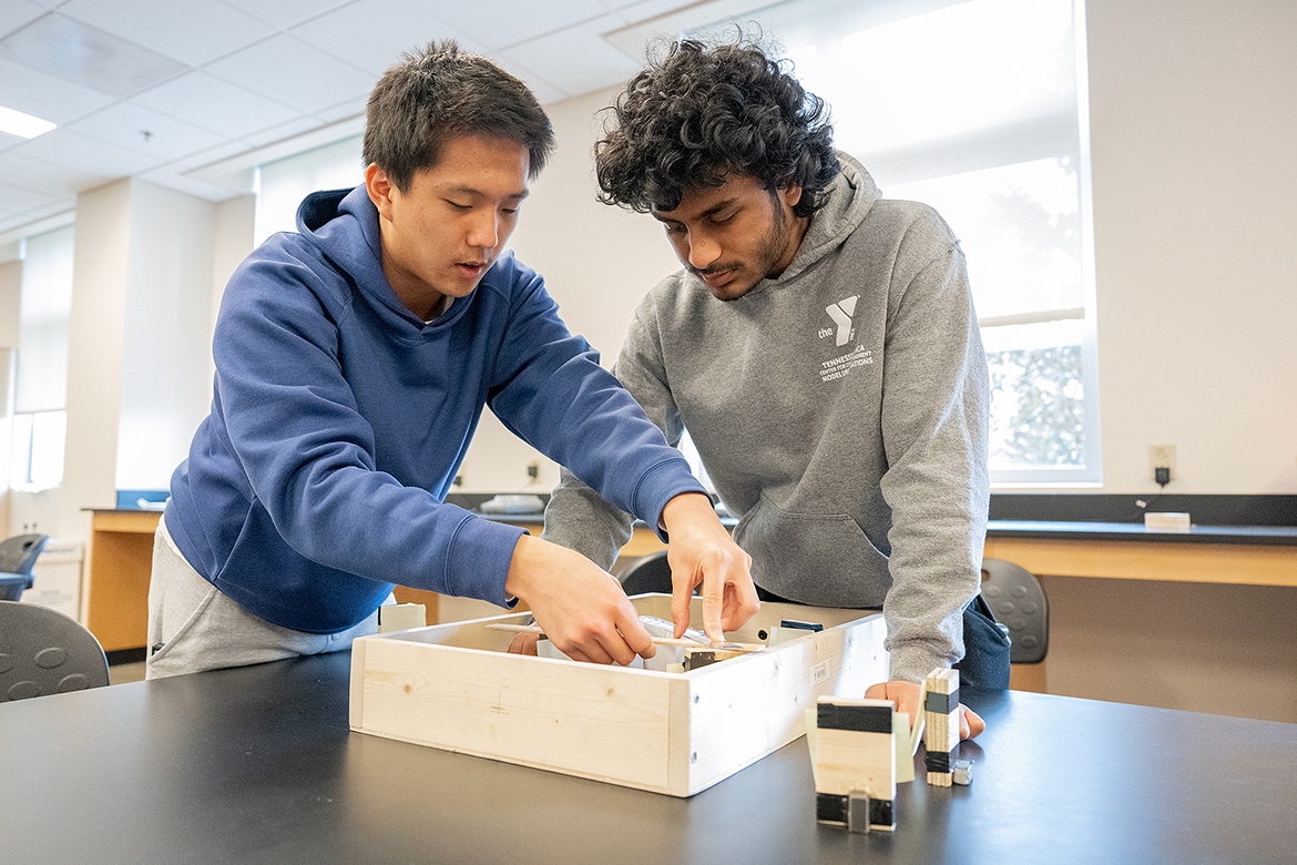 Hume-Fogg Academic High School students from Nashville, Tenn., take measurements of their Tower event project before learning how much weight it will bear in the Regional Science Olympiad Saturday, Feb. 17, in the Middle Tennessee State University Science Building. Thirteen middle school and 13 high school teams competed in the all-day event. Hume-Fogg’s high school team placed third and advanced to the State Science Olympiad in April in Knoxville, Tenn. (MTSU photo by Cat Curtis Murphy)