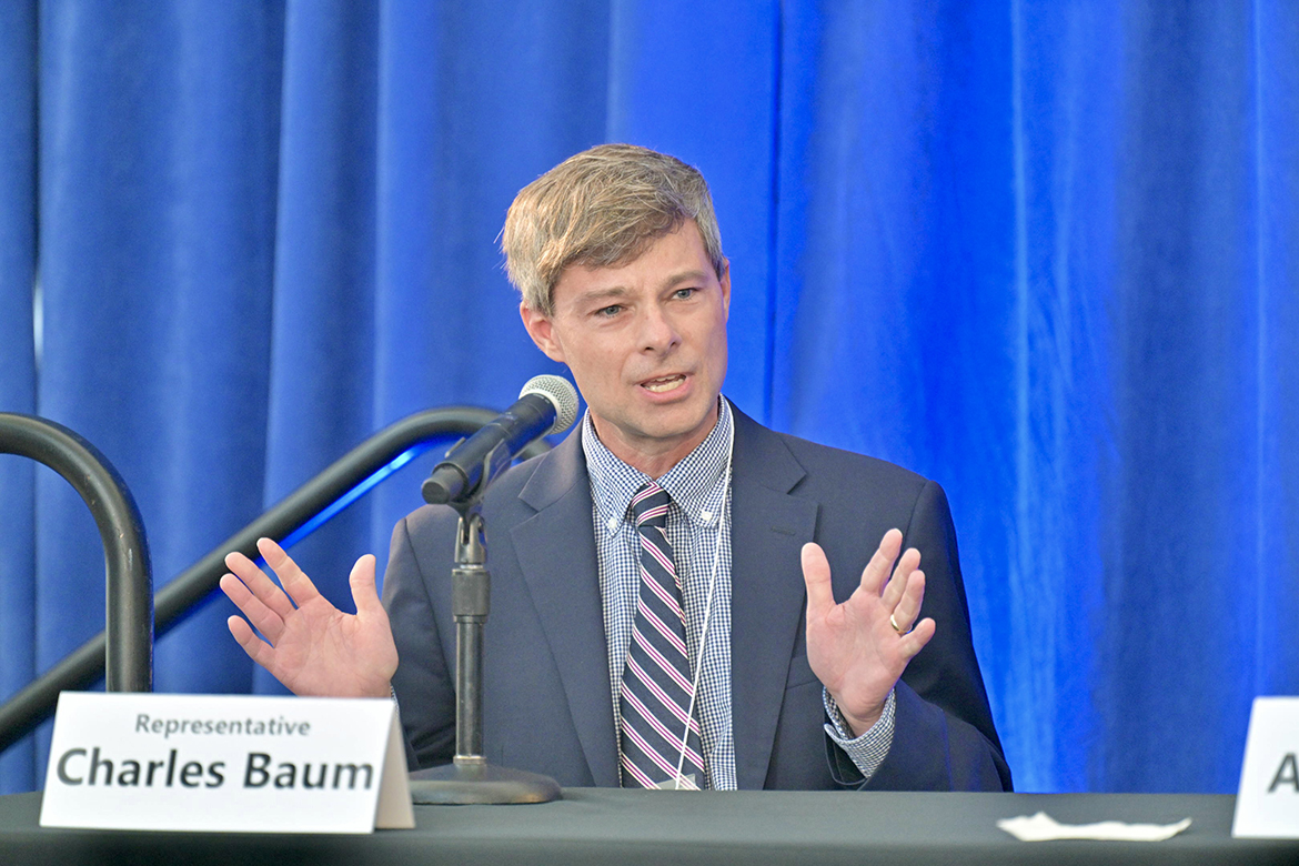State Rep. Charlie Baum of Murfreesboro, Tenn., an economics and finance professor at Middle Tennessee State University, shares comments during the civic leaders lunch panel Friday, Feb. 23, during the Tennessee Campus Civic Summit at MTSU. The event, drawing dozens of students from 10 state public and private universities, was held in the Miller Education Center’s second-floor atrium. (MTSU photo by J. Intintoli)