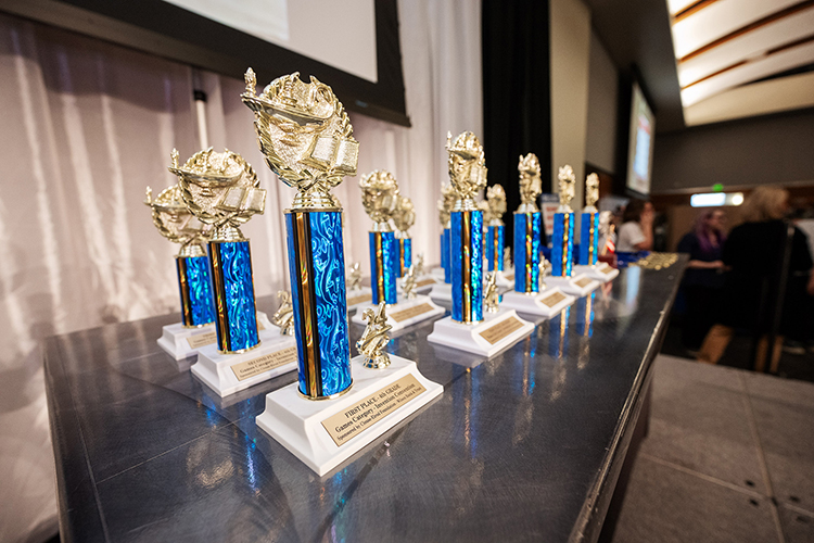 Lines of trophies wait in anticipation to be distributed to winners at Middle Tennessee State’s University annual Elementary Invention Convention in the Student Union Ballroom on Feb. 22, 2024. University staff awarded over 60 awards at the elementary and middle school events to the over 1,000 participating students from schools across the Midstate who showcased their range of inventions with the campus community. (MTSU photo by Andy Heidt)