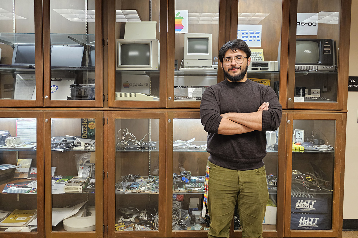 Middle Tennessee State University junior Carlos Aldana Lira of La Vergne, Tenn., is shown in front of a computer display in the Kirksey Old Main building on the MTSU campus in Murfreesboro, Tenn. His passion for computers began early in his life when he started designing video games at age 10. (MTSU photo by Robin E. Lee)