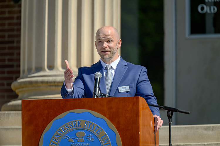 Speaking Wednesday, April 24, from the steps of Kirksey Old Main on the Middle Tennessee State University campus in Murfreesboro, Tenn., University Studies Department Chair Matthew Duncan discusses the positive impact of the $54.3 million renovation project to upgrade Kirksey will have on the multiple CBAS departments housed there. The project, which also includes transforming nearby Rutledge Hall from a dormitory to an academic building, begins in mid-May with an expected completion by summer 2026. (MTSU photo by J. Intintoli)