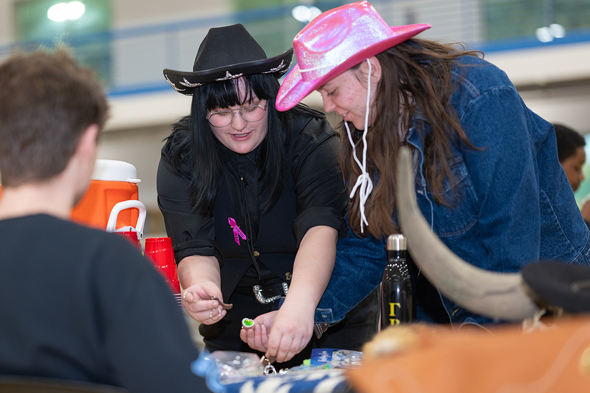 Middle Tennessee State University students take part in a key chain activity during the annual MTSU Relay for Life, held March 22 in the MTSU Campus Recreation Center in Murfreesboro, Tenn., in the. Students spent many months coordinating fundraising efforts with campus and community sponsors. (MTSU photo by Cat Curtis Murphy)