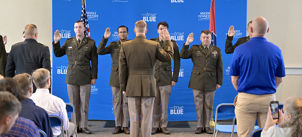 Six former Middle Tennessee State University ROTC cadets in the Military Science program listen during the special ceremony where they were commissioned as second lieutenants in various branches of the U.S. Army. The newly commissioned officers include Jonathan Cordine, Jacob Dobbs, Sebastien Kernisant, Braedon “Scotty” McGinnis, Alex Piacenti and Zachary Steinke. The ceremony occurred May 3 in the Tom H. Jackson Building’s Cantrell Hall on the MTSU campus in Murfreesboro, Tenn. (MTSU photo by Andy Heidt)