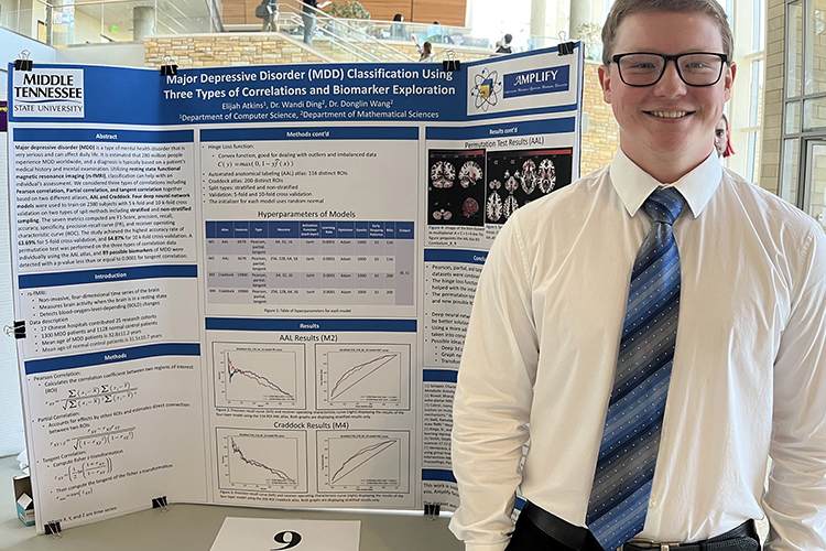 Elijah Atkins, a computer science major at Middle Tennessee State University in Murfreesboro, Tenn., is one of nine MTSU undergraduates who was accepted to a prestigious National Science Foundation Research Experience for Undergraduates placement this summer. Atkins, pictured here presenting his research, will work on a biomedical informatics research project at Vanderbilt University in Nashville, Tenn. (Submitted photo)