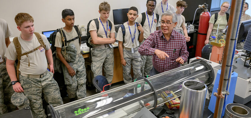 Middle Tennessee State University chemistry professor Sing Chong, in foreground, explains equipment he utilizes in his research conducted in the Science Building to a group of Civil Air Patrol cadets from across the country participating in a national-level science and engineering academy hosted by the MTSU College of Basic and Applied Sciences on the campus in Murfreesboro, Tenn. The youths are part of the U.S. Air Force volunteer civilian auxiliary’s National Cadet Engineering Technology Academy, also known as E-Tech, which the university has hosted since 2017. (MTSU photo by J. Intintoli)