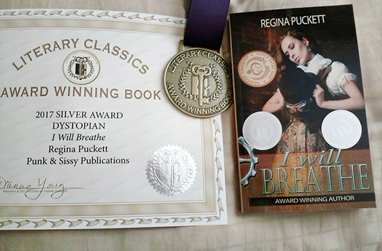 "I Will Breathe,” at far right, winner of the 2017 silver medal in the Science Fiction/Dystopian category from Literary Classics. The author is Regina Puckett, an account clerk in the MTSU Office of Development and Advancement Services. (Photos submitted)